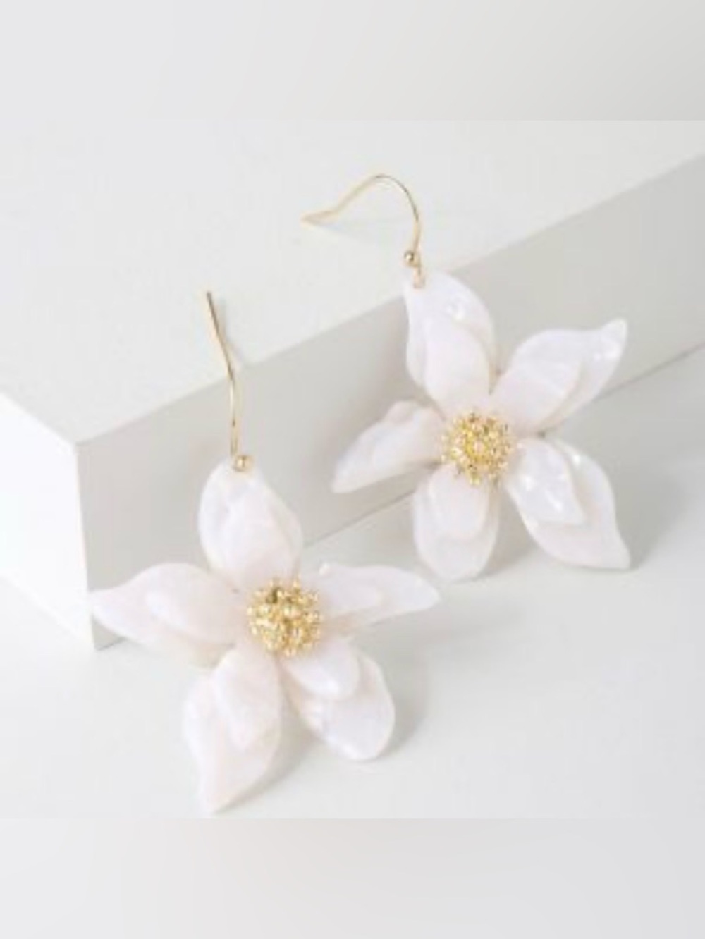 White Floral Drop Earrings with Gold Center Detail